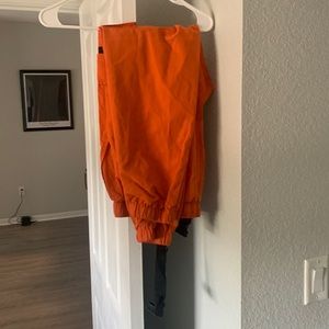 Orange pants with buckle